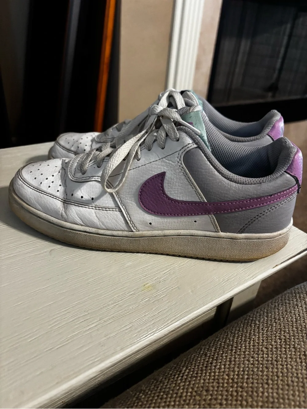Nike Women’s White Sneakers with Purple Swoosh